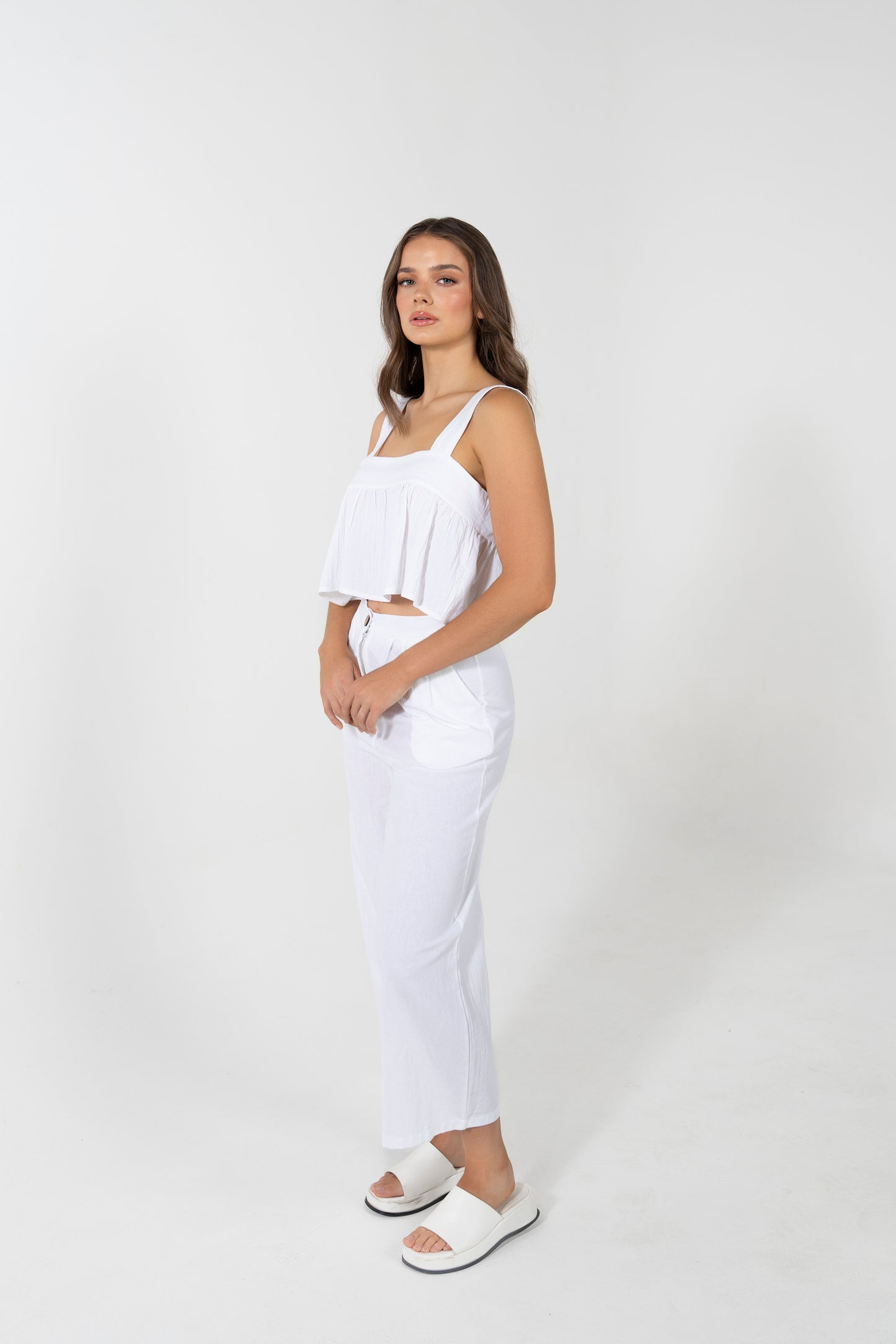 EZRA CROP FRILL BUTTON BACK TOP IN WHITE