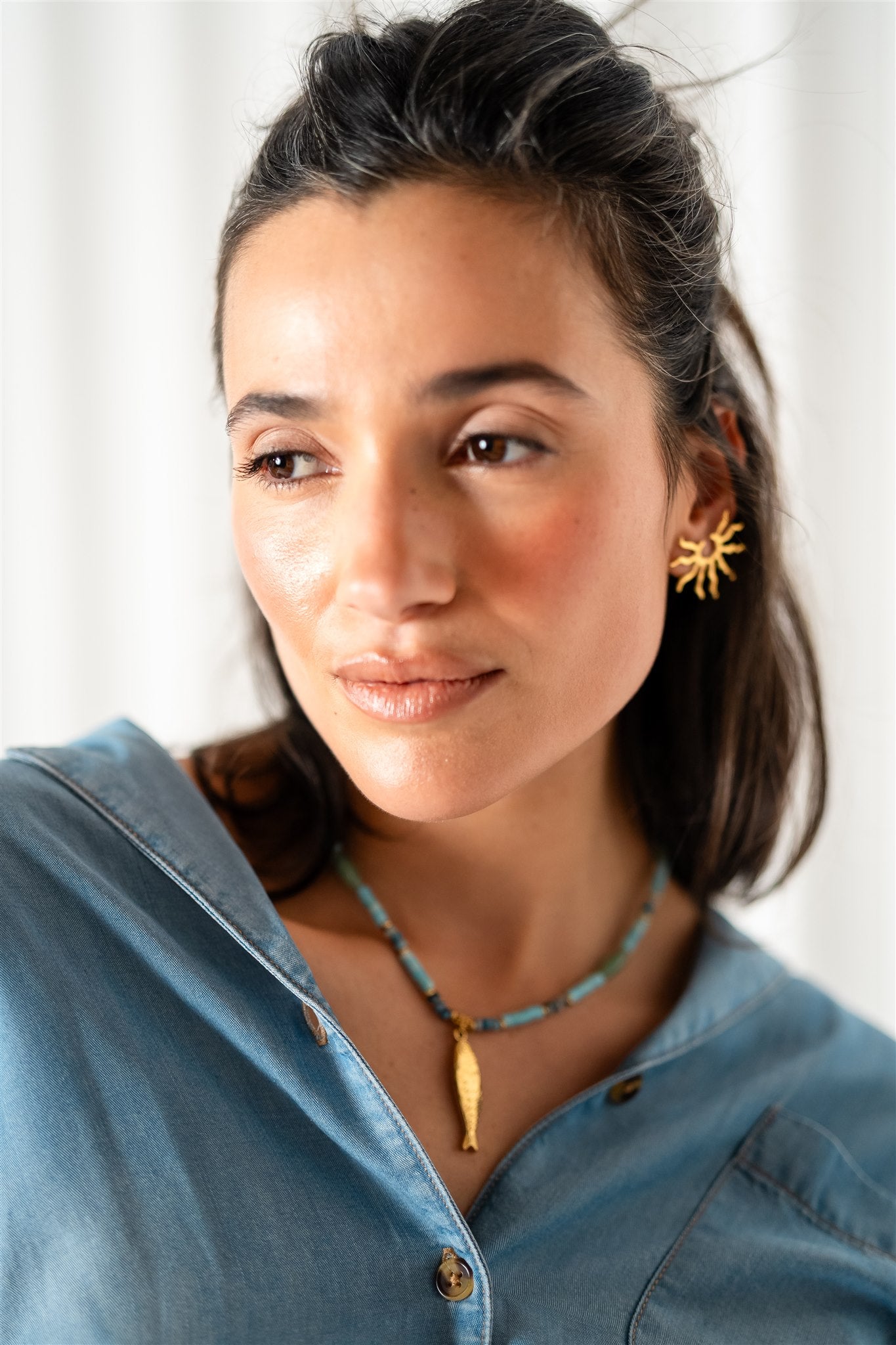 Alba Ocean blue beaded gold fish pendant