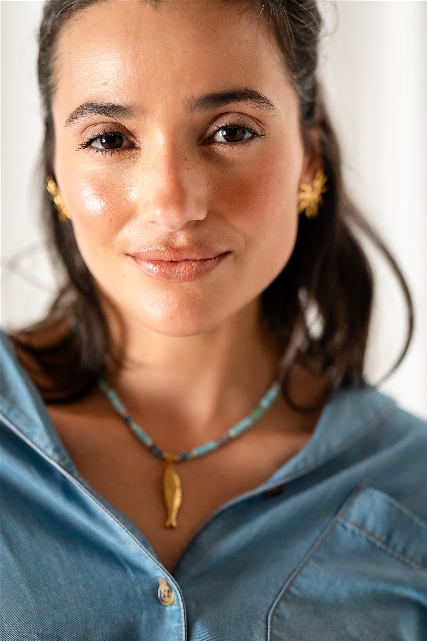 Alba Ocean blue beaded gold fish pendant